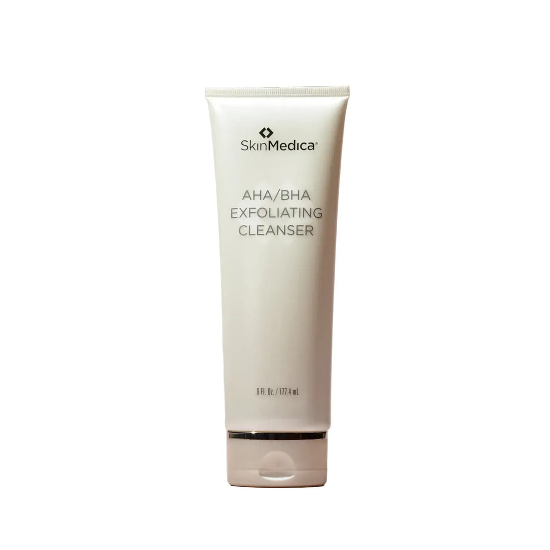 Tube of SkinMedica AHA/BHA Exfoliating Cleanser on a pink background