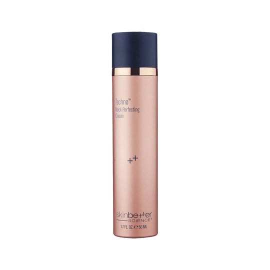 Skincare bottle with rose gold body and navy blue cap on a light gray background