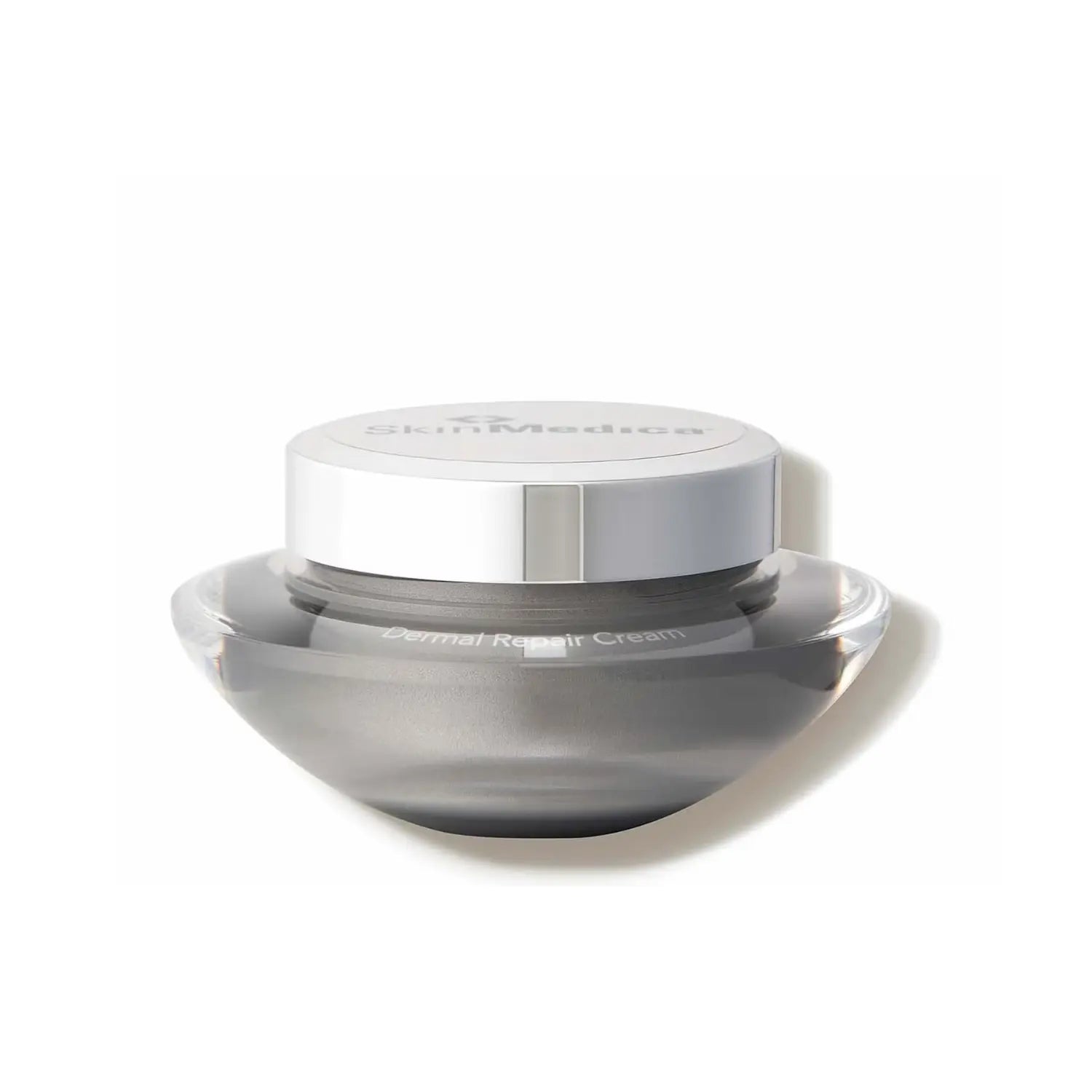 Skincare jar with silver lid on a white background